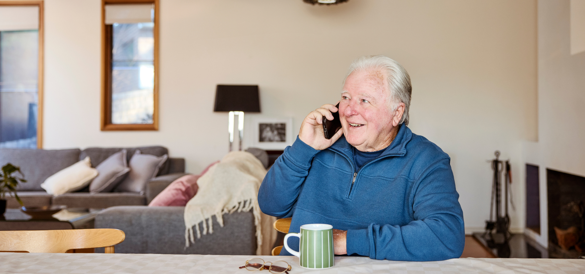 An older man on the phone.